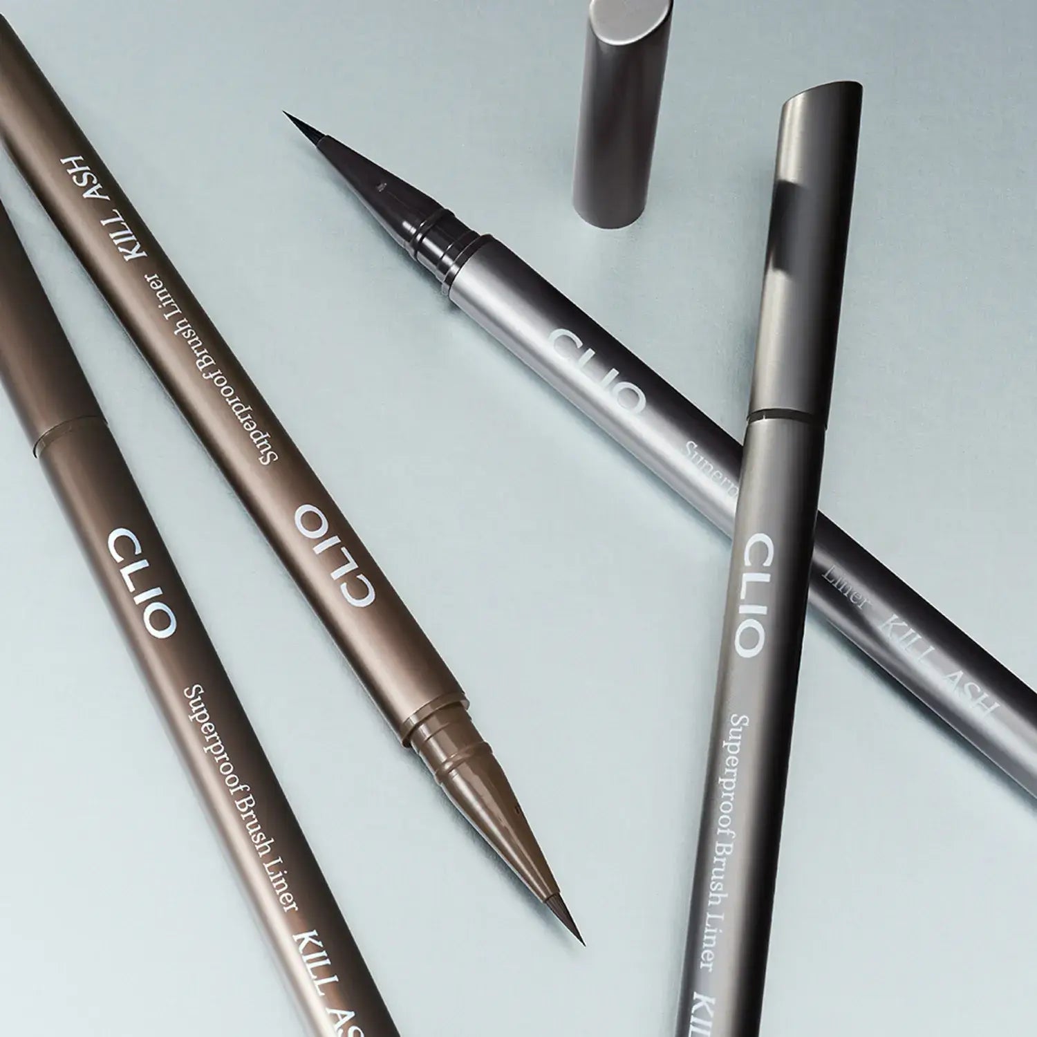 CLIO Superproof Brush Liner Kill Ash: High-precision, waterproof eyeliners in various shades for long-lasting wear.