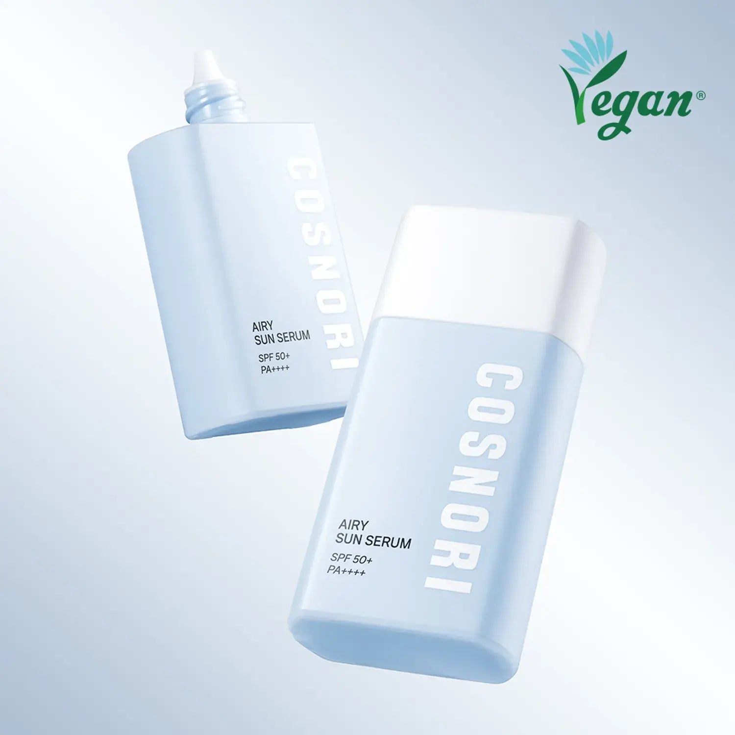 COSNORI Airy Tone Up Sun Serum bottles with vegan logo, SPF 50+ protection for brightening and sun care, displayed on a blue background.