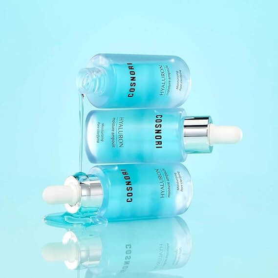 COSNORI Hyaluronic Moisture Ampoule 30ml bottles with blue liquid background