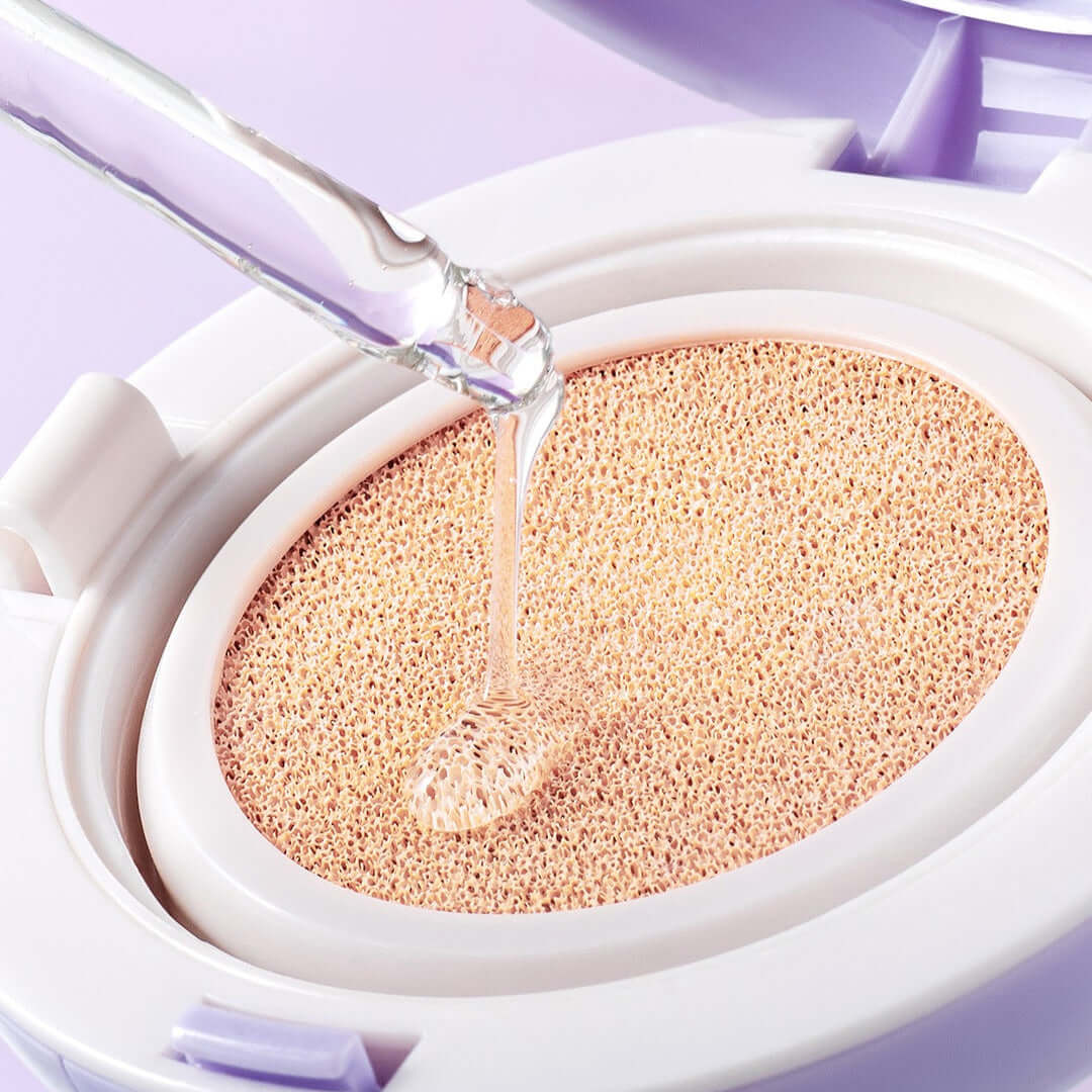 COSNORI Panthenol Barrier Cushion SPF50+PA++++ with liquid being applied to cushion surface