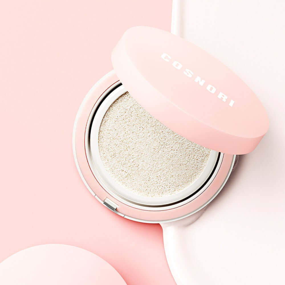 COSNORI Tone-up Cream Cushion in pink compact on pastel background