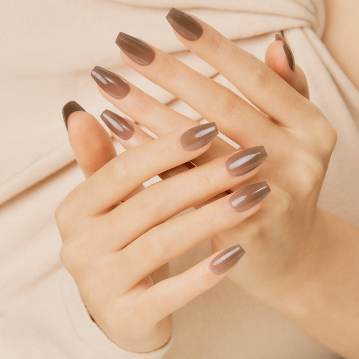 DASHING DIVA MAGIC PRESS Cinnamon Brown - Coffin nails on hands, showcasing elegant manicure style.