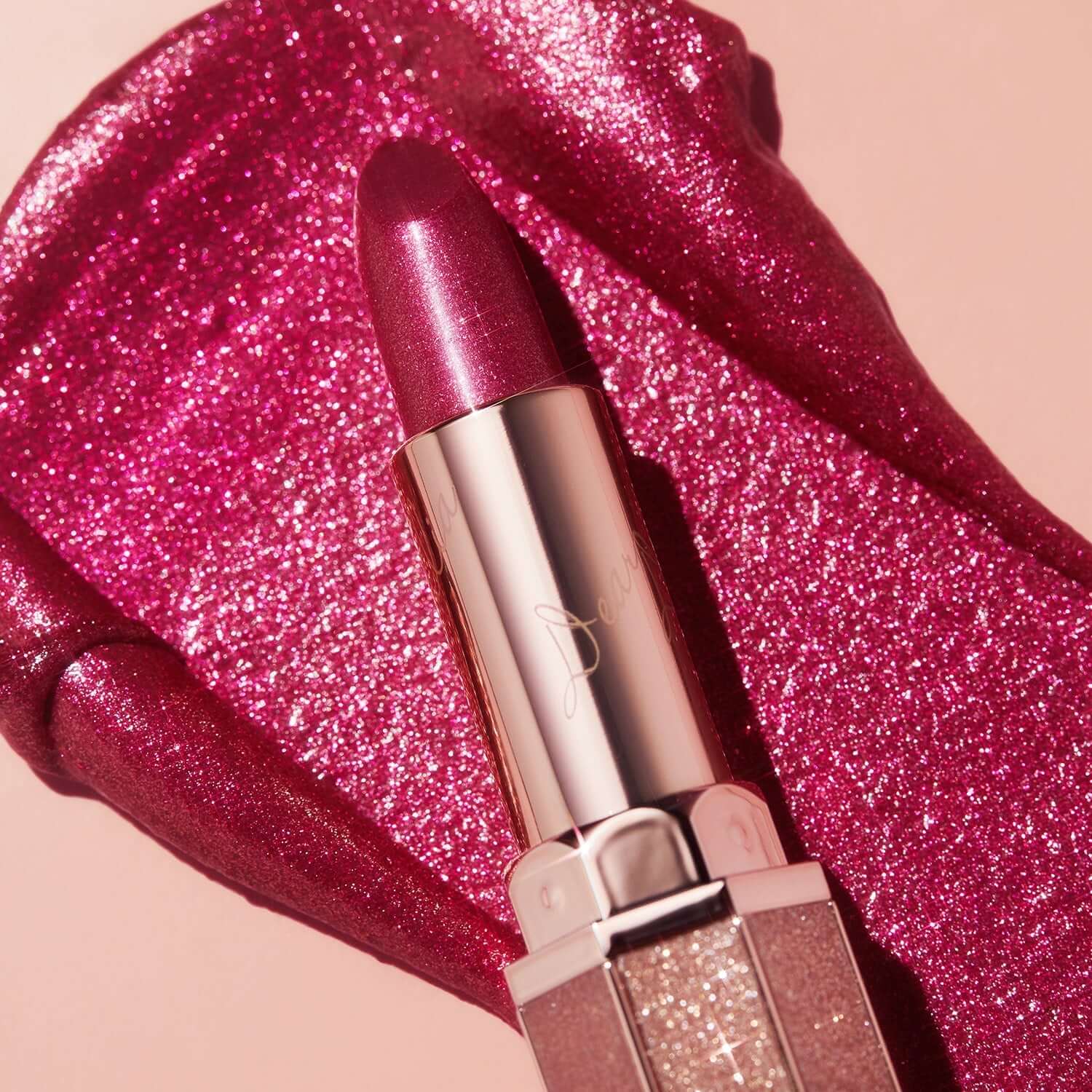 DEAR DAHLIA Allure Shine Lustrous Lip Plumper in a sparkling pink hue with glossy finish, ideal for vibrant and luscious lips.