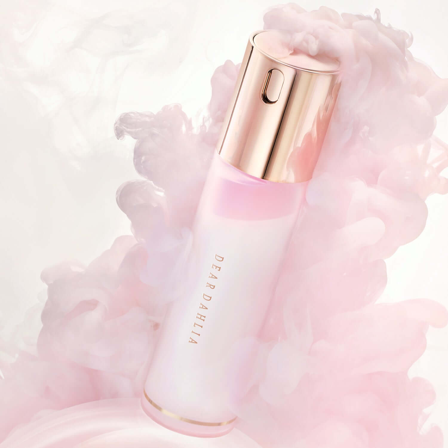 DEAR DAHLIA Endless Skin Cream Mist in elegant pink and golden bottle surrounded by soft pastel clouds for a luxurious feel