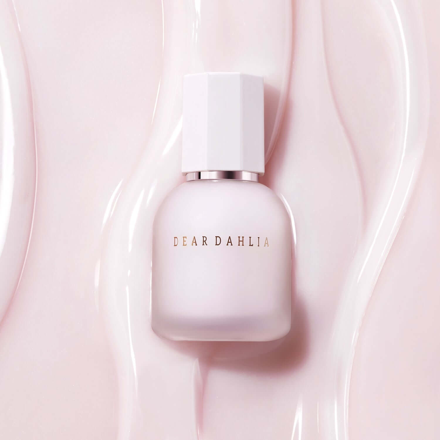 DEAR DAHLIA Prime Layer Skin Prep in elegant packaging on pink background