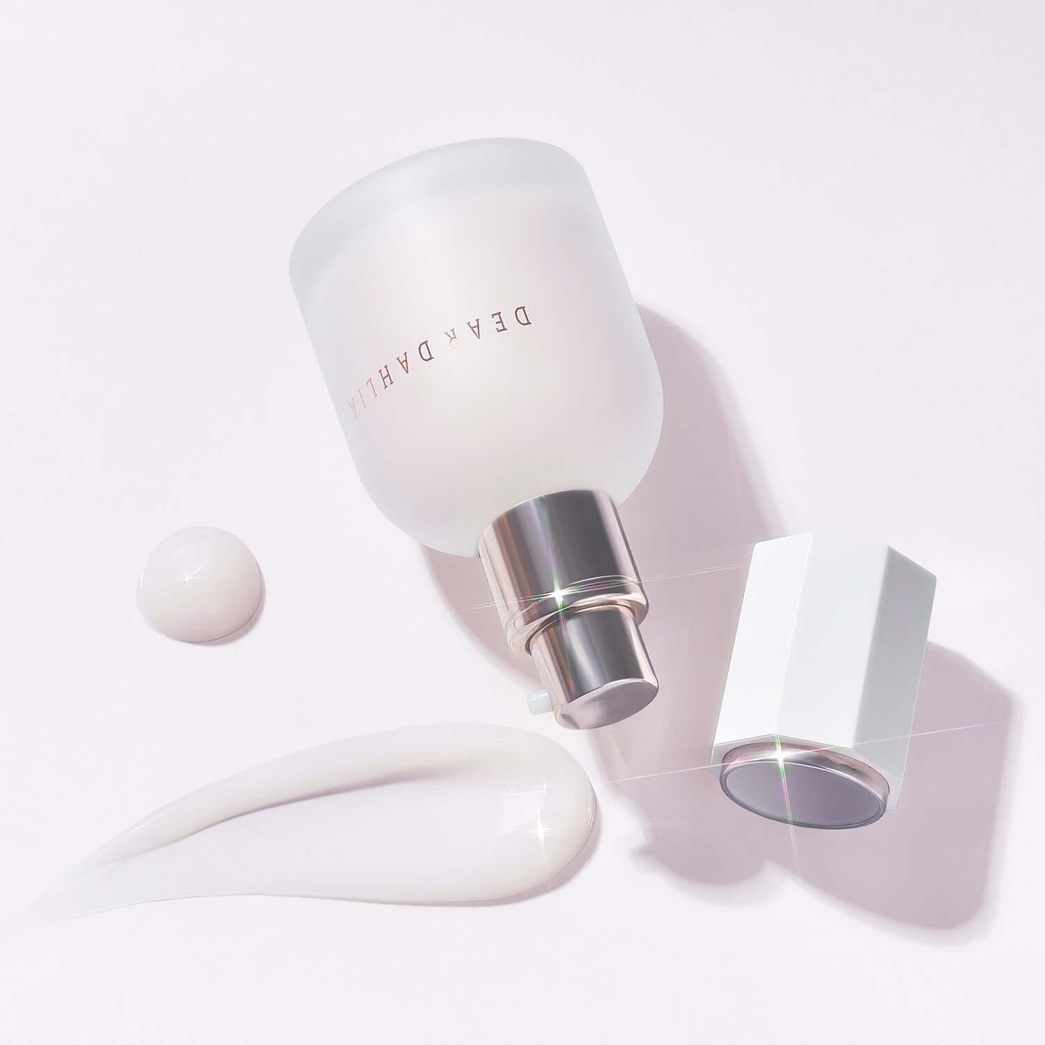 DEAR DAHLIA Prime Layer Skin Prep product with open cap and creamy texture on a light surface.