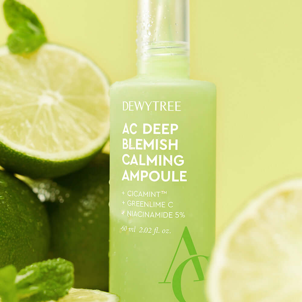 DEWYTREE AC Deep Trace Soothing Ampoule Planning Set 60ml surrounded by fresh limes, showcasing its soothing properties.