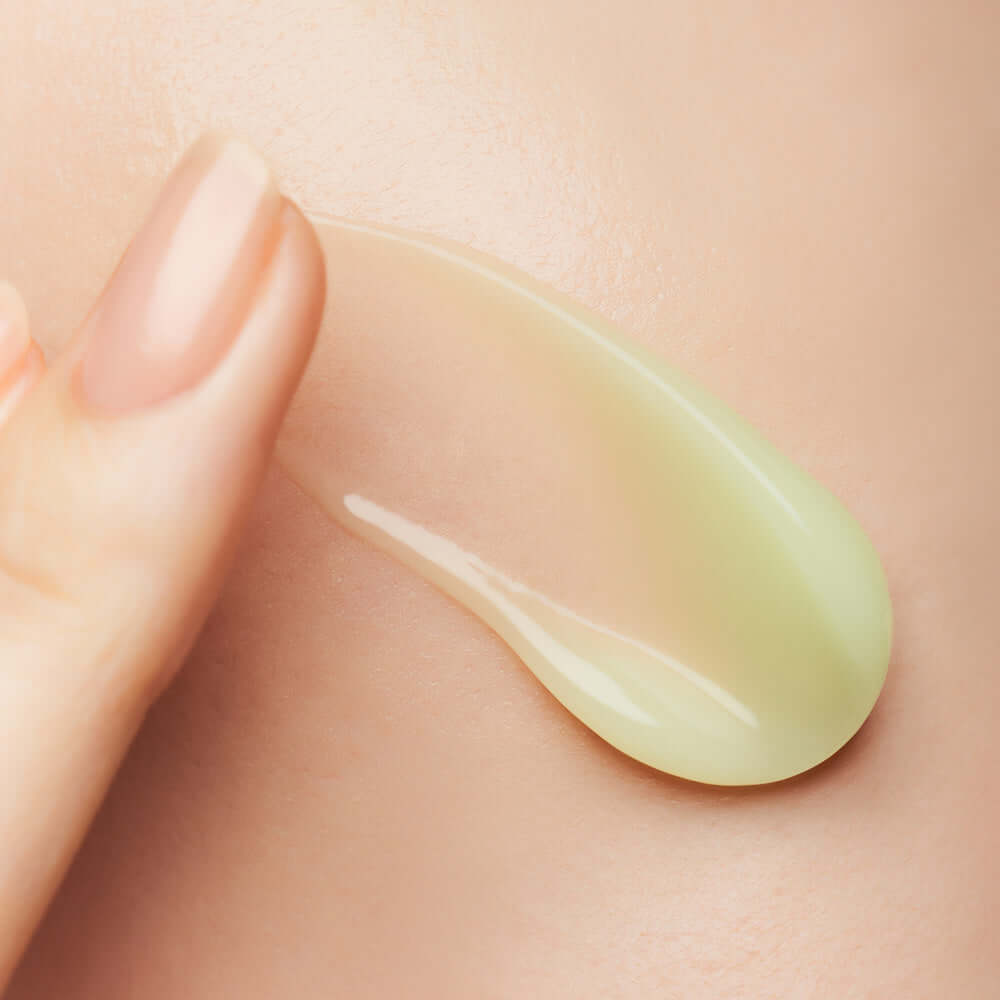 Applying DEWYTREE AC Deep Trace Soothing Cream 60ml on skin