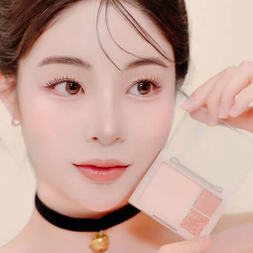 Woman showcasing the versatile DINTO Cheek & Eye Multi-Use Palette