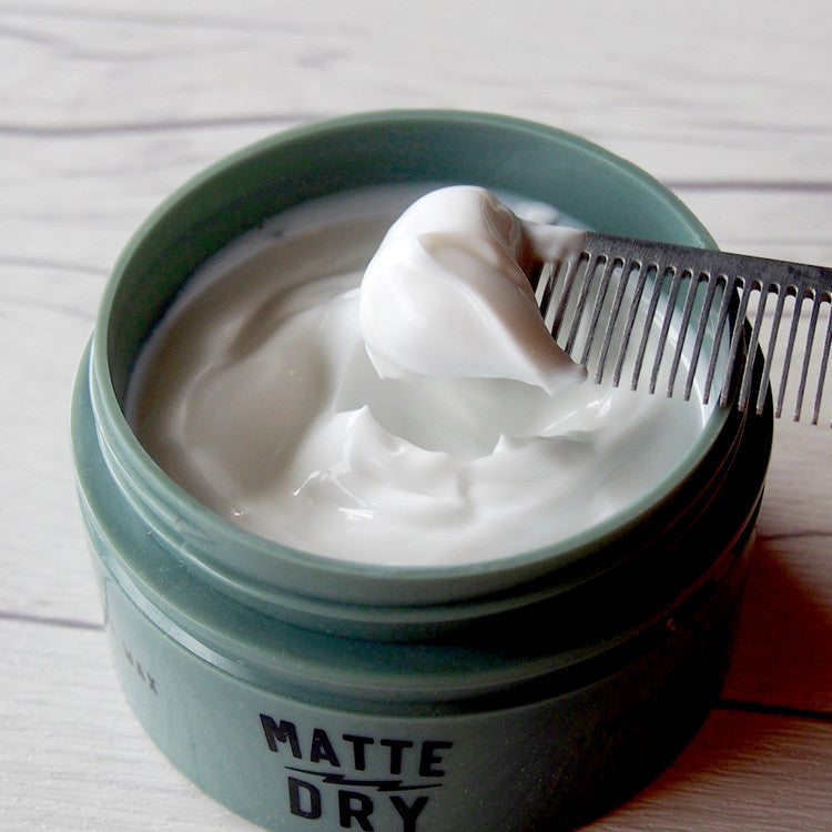DOORS Superior Wax Matte Dry 80g - Gentleman Korea men’s matte hair wax in jar shown with comb scooping product