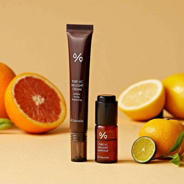 DR.CEURACLE Pure VC Melite Cream 20ml with citrus fruits in the background.