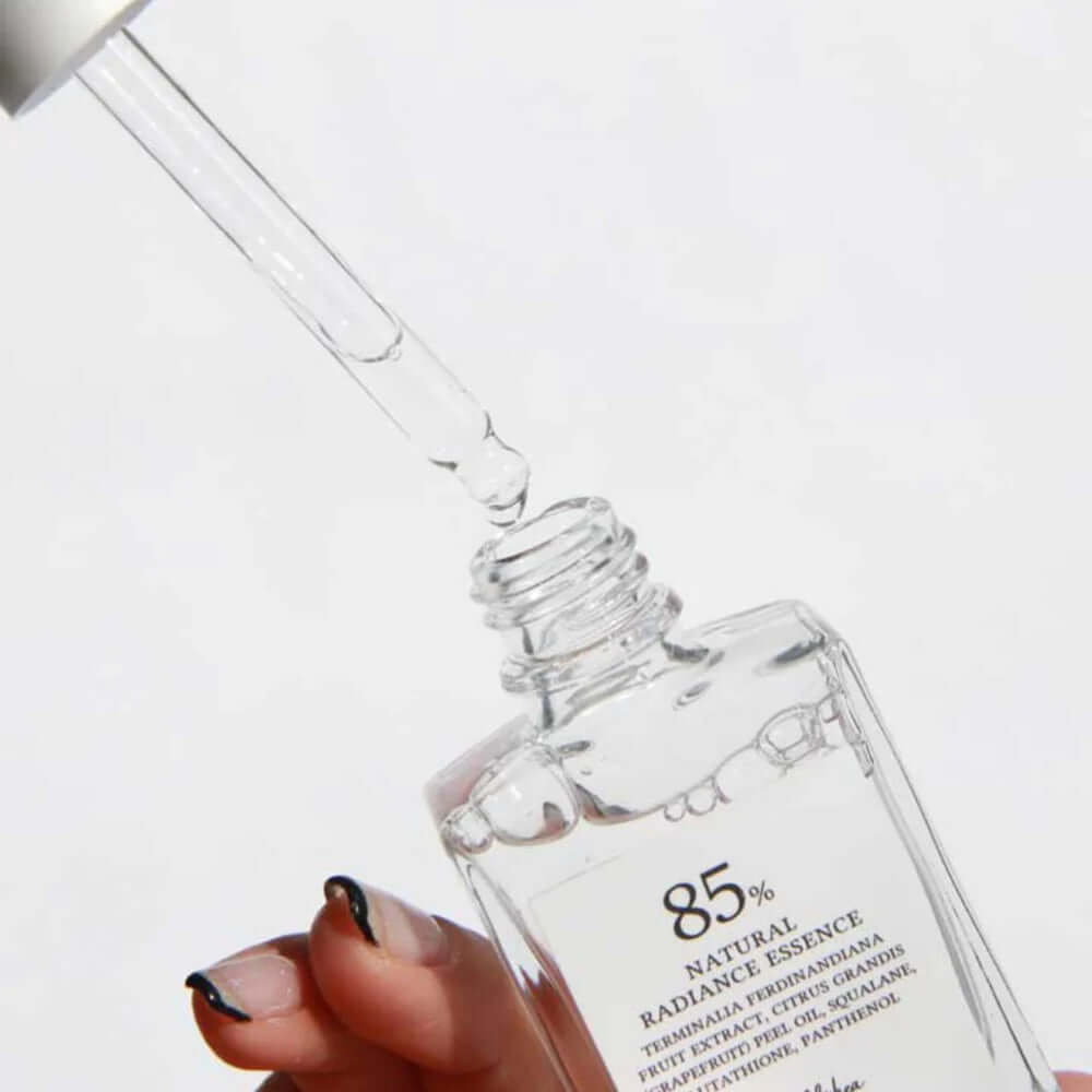 DR.ALTHEA Natural Radiance Essence 30ml, clear serum bottle with dropper showcasing the product's texture and application.