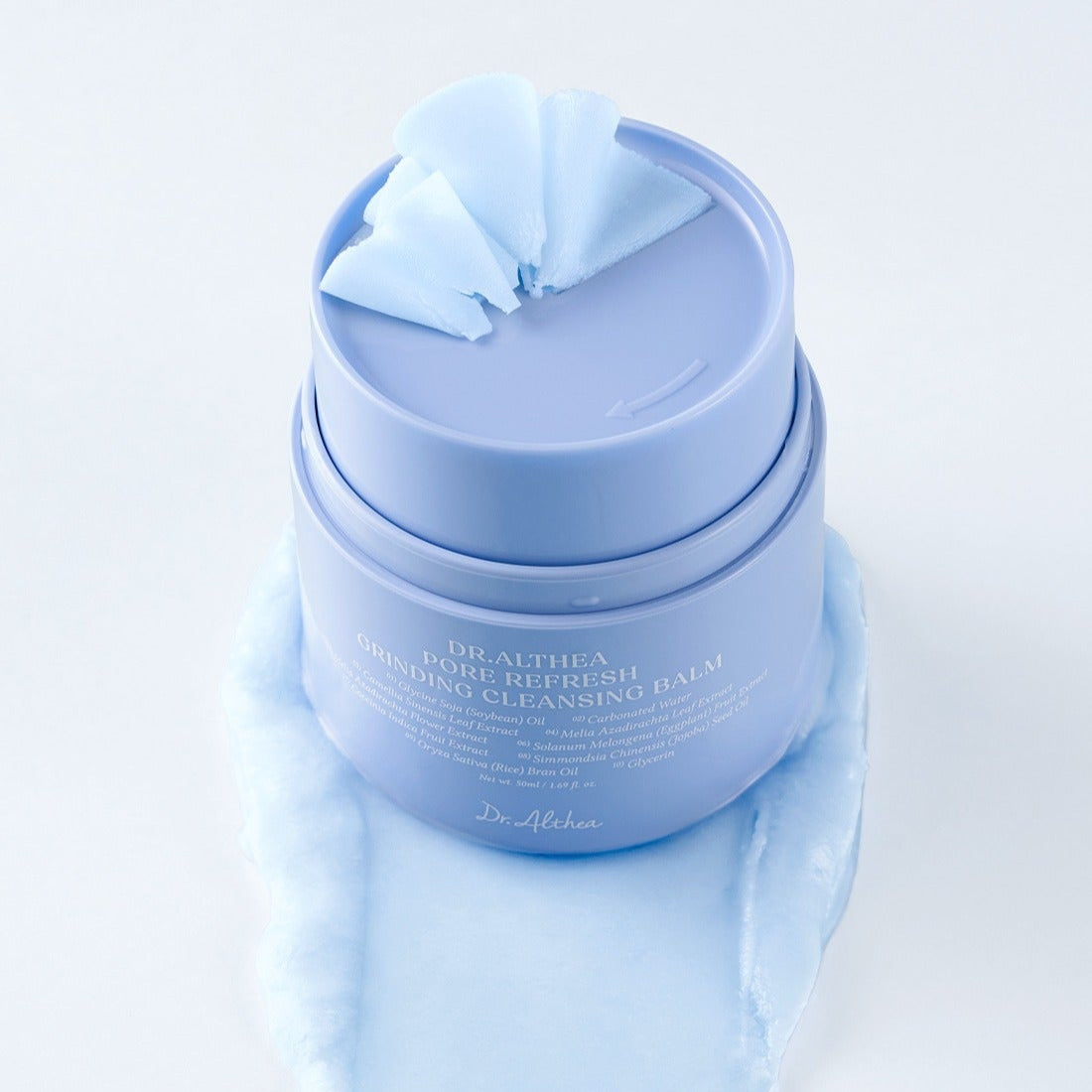 DR.ALTHEA Pore Refresh Grinding Cleansing Balm 50ml in blue jar with lid open, showcasing texture on white background.