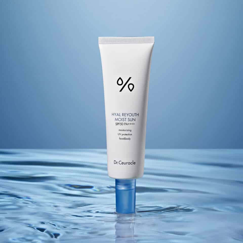 DR.CEURACLE Hyal Reyutsu Moist Sun SPF50+,PA++++ tube on water surface