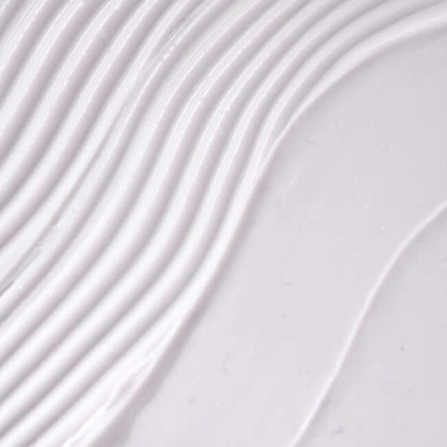 Smooth texture of DR.G Bakuchiol Porejet Cream with delicate streaks on the surface.