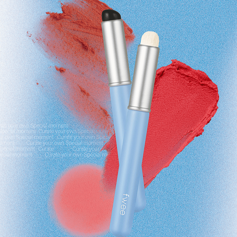 FWEE Fingerlike Lip Brush with dual-tips for precise lip application on a blue background.