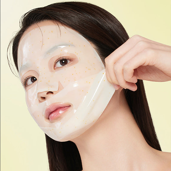 Woman applying GOODAL Gel Mask (Green Tangerine/Eoseongcho) for skincare routine