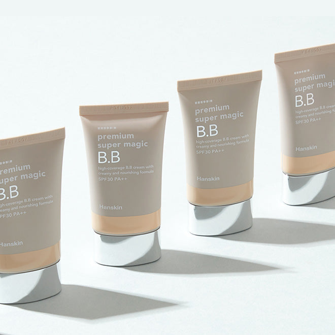 HANSKIN Premium Super Magic BB Cream 45g tubes displayed in a row with reflective caps, highlighting premium skincare product.