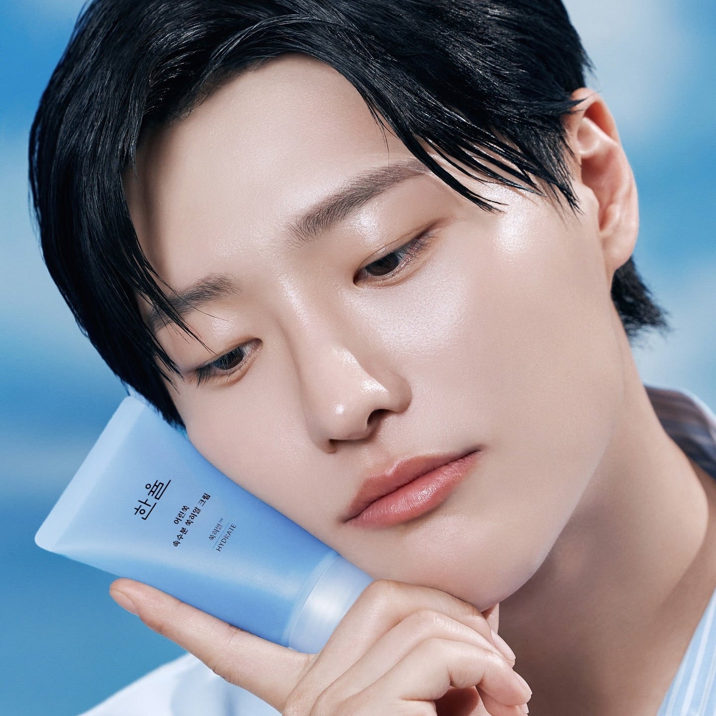 Person holding HANYUL Young Artemisia Extract Moisturizing Cream 60ml against face