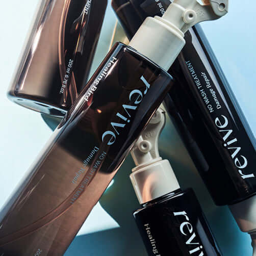 HEALING BIRD Revive No-Wash Treatment Damage Repair 200ml bottles displayed on a surface