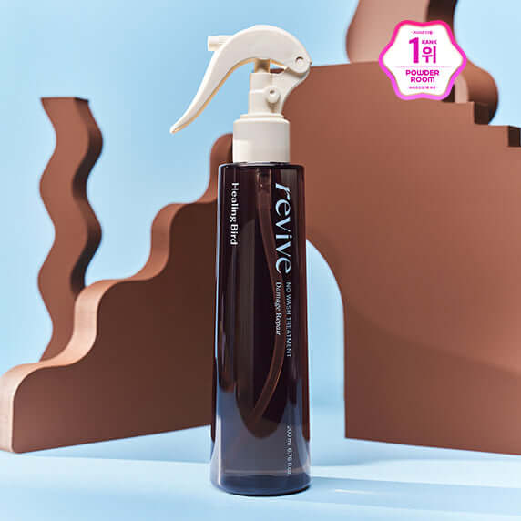 HEALING BIRD Revive No-Wash Treatment Damage Repair 200ml spray bottle on decorative background