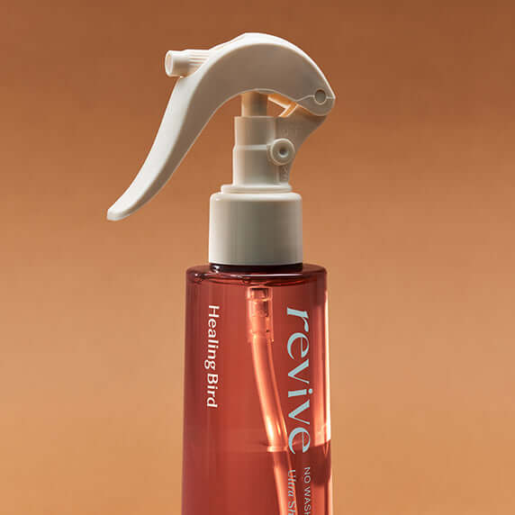 HEALING BIRD Revive No-Wash Treatment Ultra Shine Plan 200ml bottle with trigger spray.