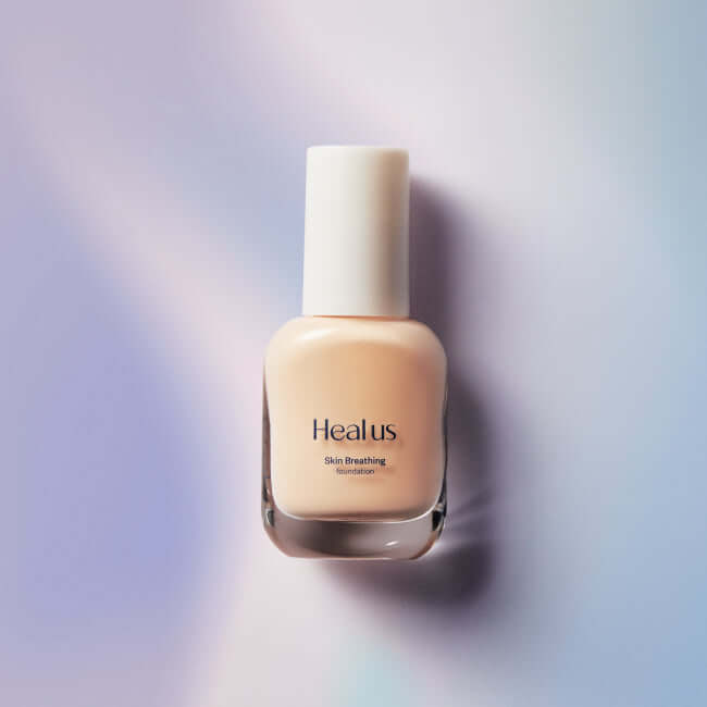 HEALUS Breath Foundation Glow SPF 35 PA++ bottle on a gradient background