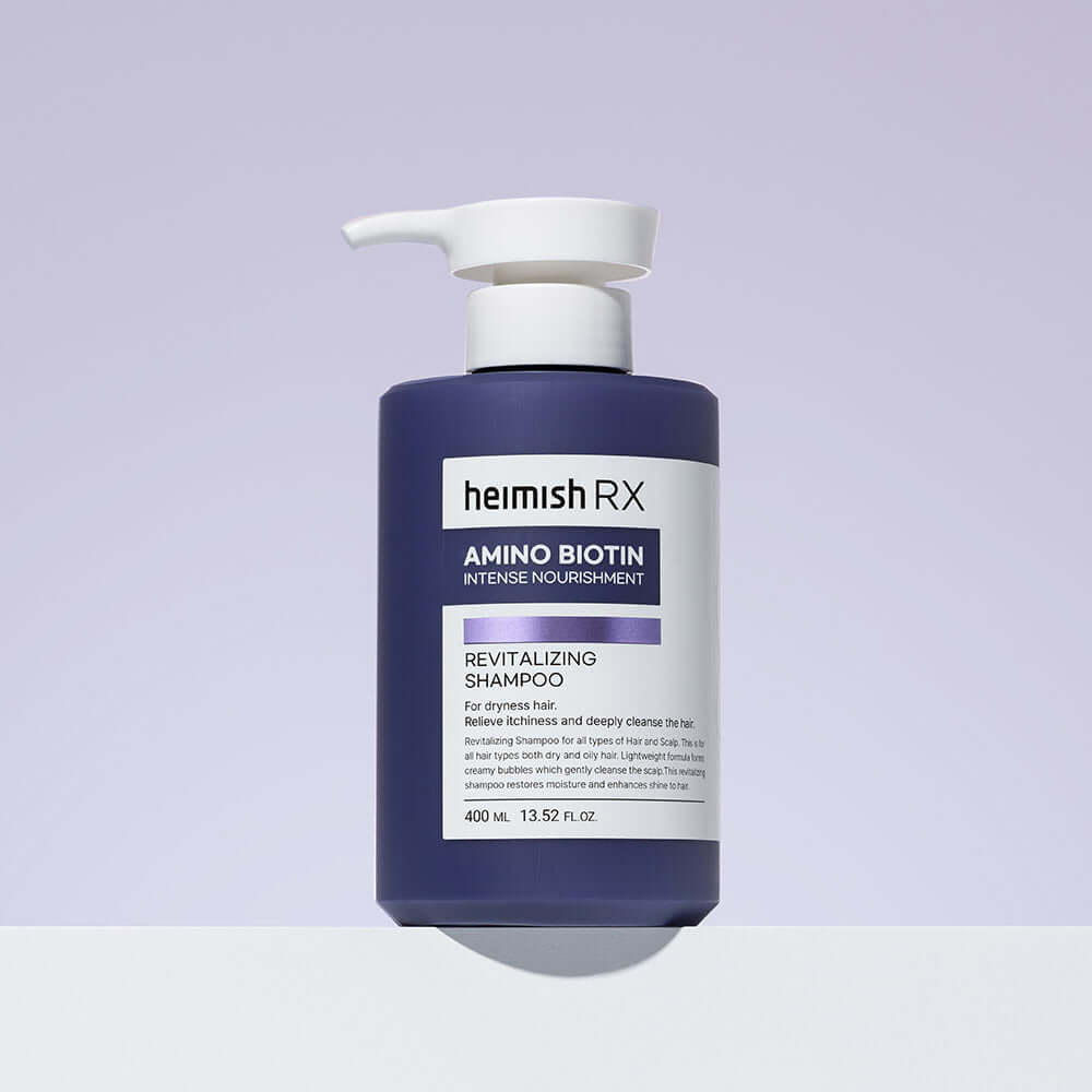 HEIMISH RX Amino Biotin Revitalizing Shampoo 400ml bottle against a light purple background