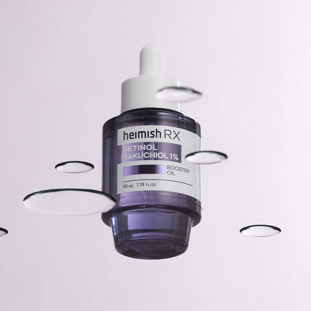 HEIMISH RX Retinol Bakuchiol Booster Oil 35ml purple bottle floating with liquid droplets