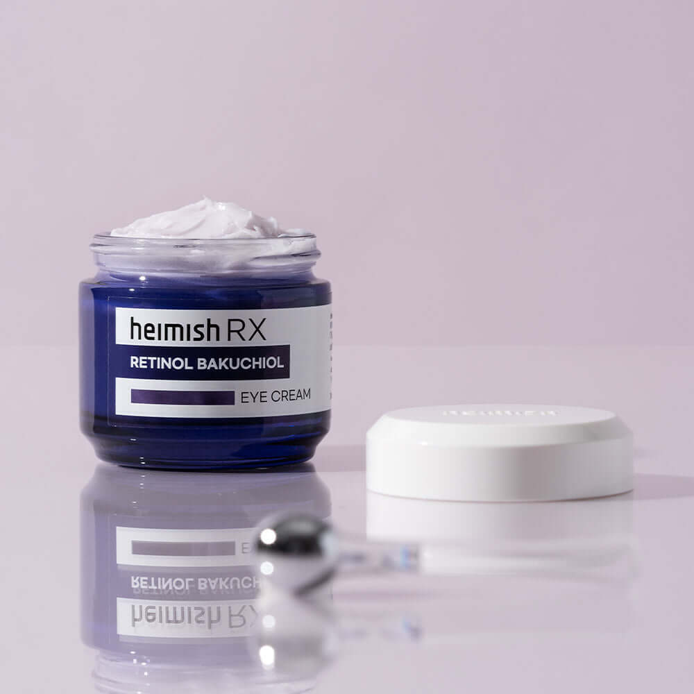 HEIMISH RX Retinol Bakuchiol Eye Cream 30ml jar with open lid on a reflective surface