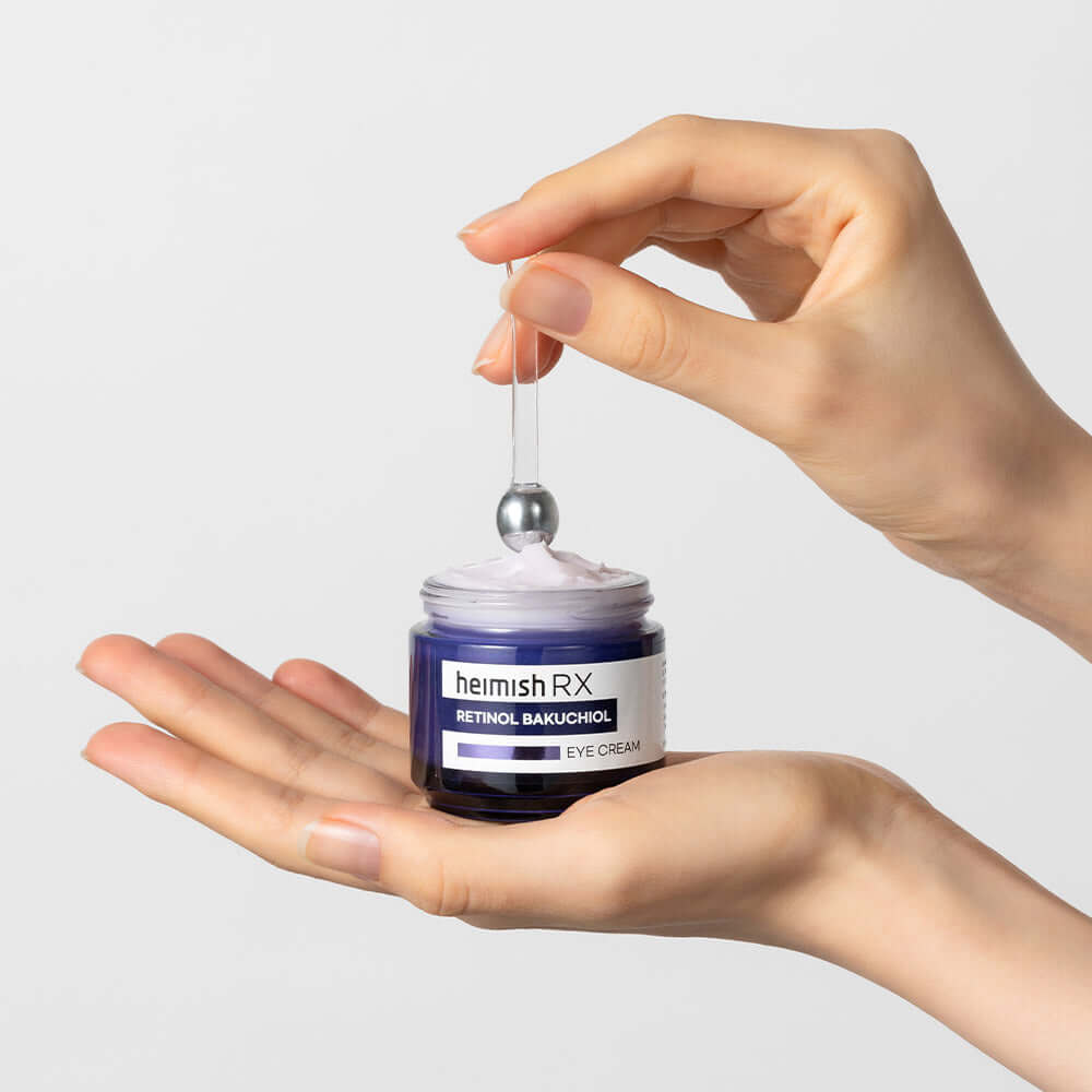 Close-up of HEIMISH RX Retinol Bakuchiol Eye Cream 30ml in hand with applicator