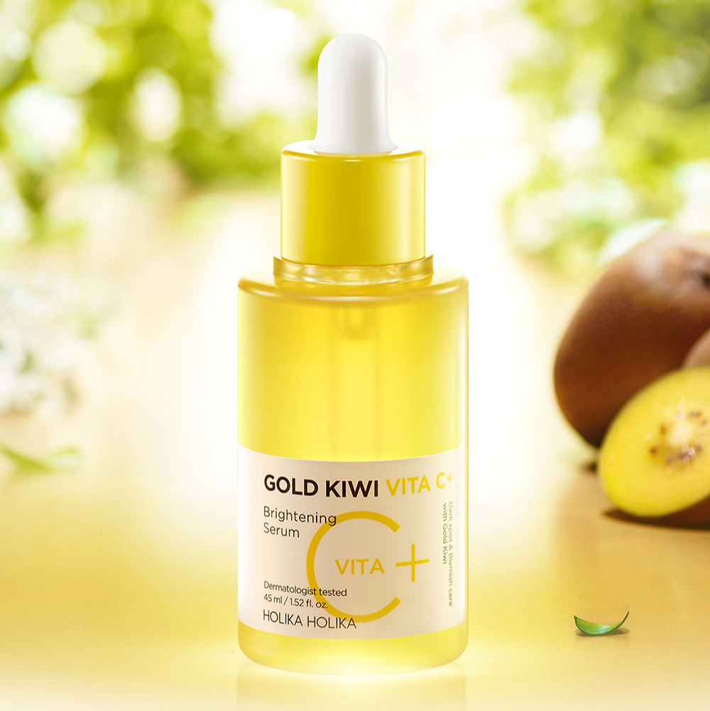 HOLIKA HOLIKA Gold Kiwi Vita C+ Brightening Serum 45ml bottle with fresh kiwi slices in the background