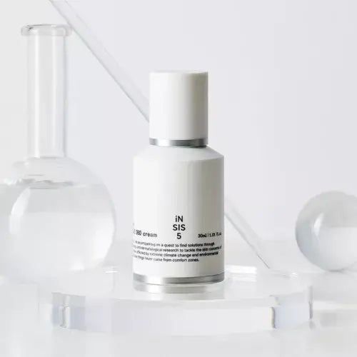 HUXLEY Biosys 360 Ampoule bottle with minimalist design in a laboratory-inspired setting for skincare enthusiasts.