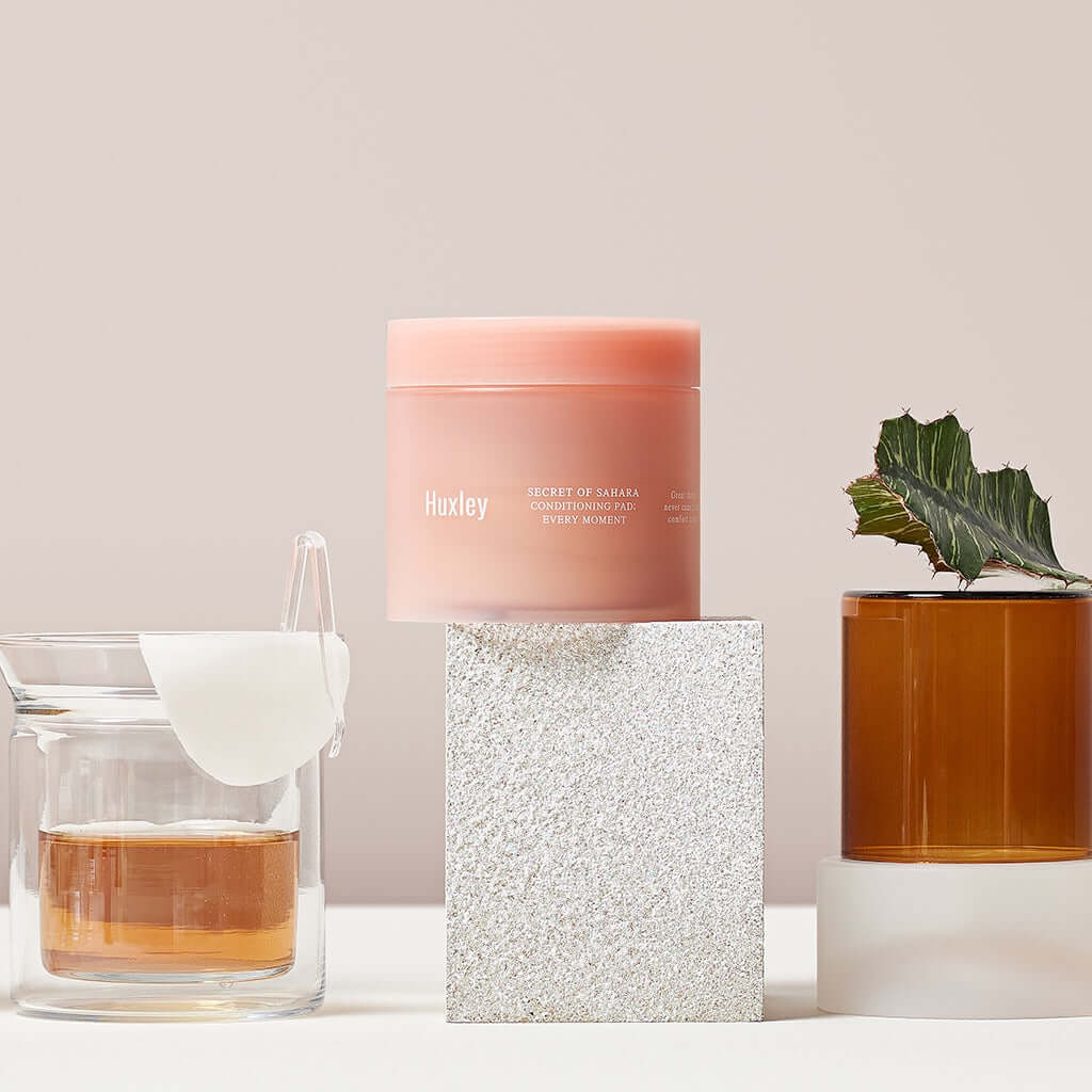 HUXLEY Conditioning Pad Every Moment with skincare setup on display