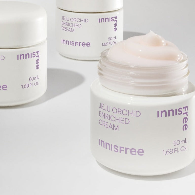INNISFREE Jeju Orchid Enriched Cream 50ml displayed in open jar with smooth cream texture