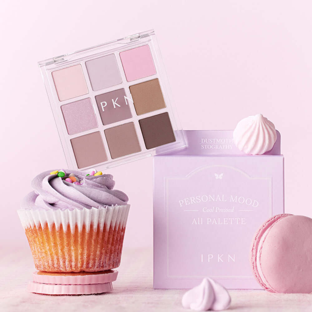 IPKN Personal Mood All Palette Cool Pressed 6.8g eyeshadow set displayed with pastel macarons and cupcake