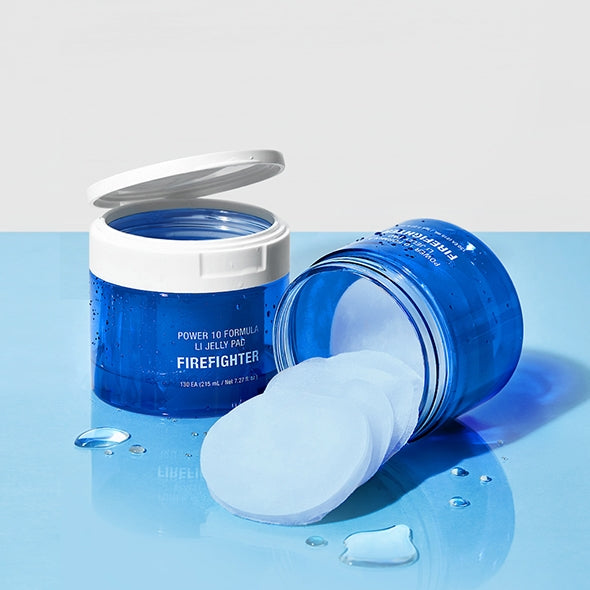 IT'S SKIN Power 10 Licorice Julen Jelly Pad 130 Sheets open jars on blue surface