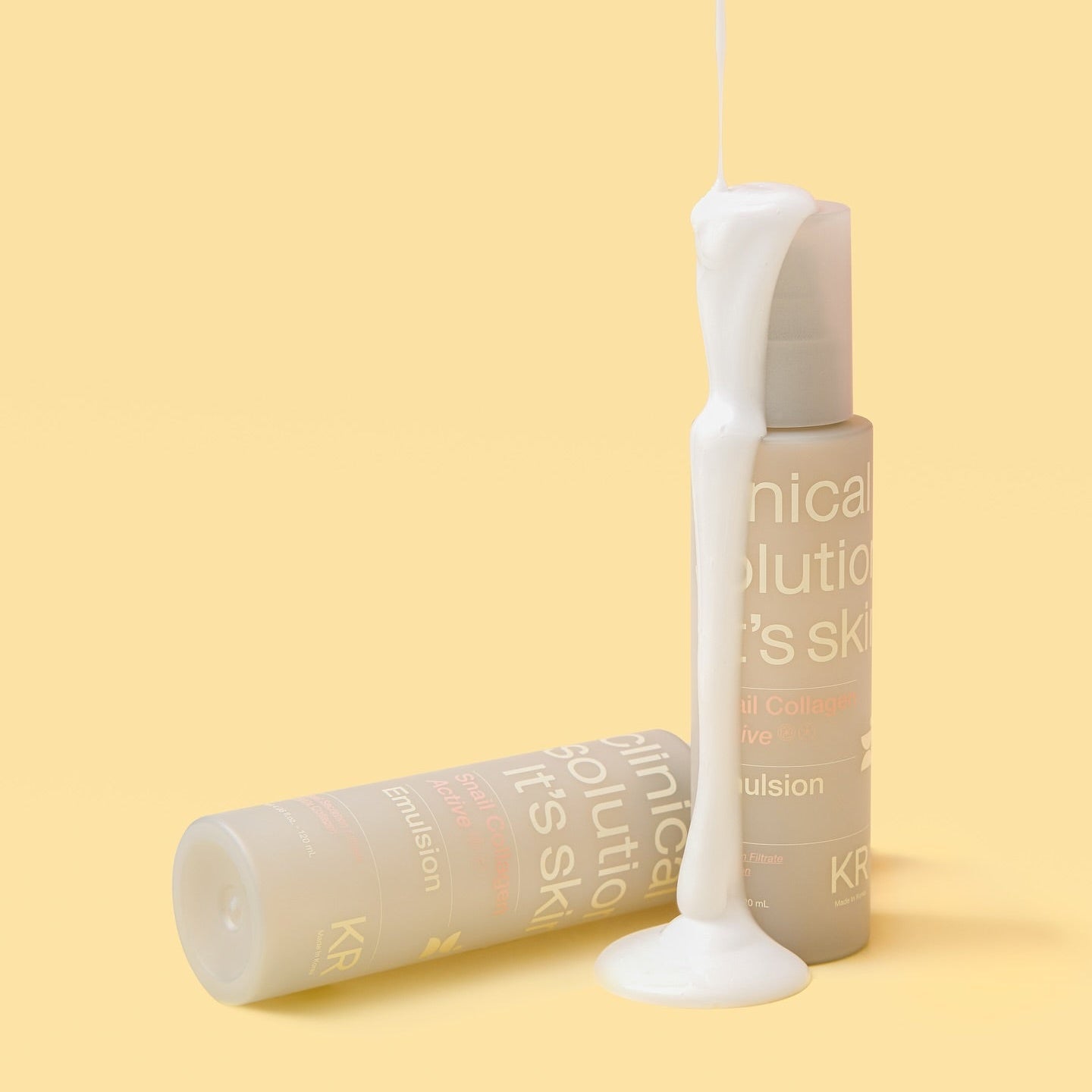 IT'S SKIN Snail Collagen Active Emulsion 120ml bottles with emulsion pouring on a yellow background