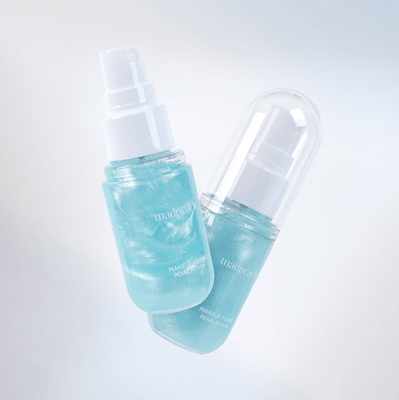 IVI MAD PEACH Makeup Fixing Pearl Potion 30ml spray bottle with shimmering blue liquid
