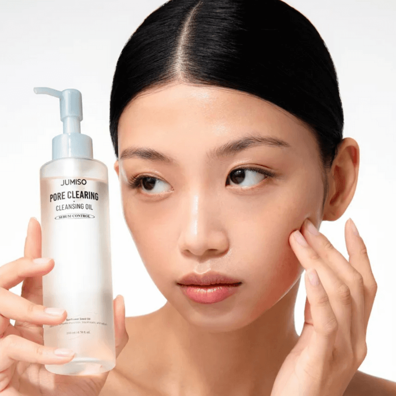 Woman using JUMISO Pore Clearing Cleansing Oil 200ml for skincare routine