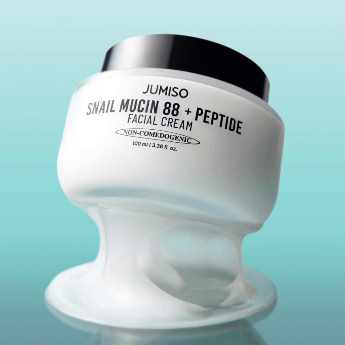 JUMISO Snail Muci 88 + Peptide Cream jar on teal background