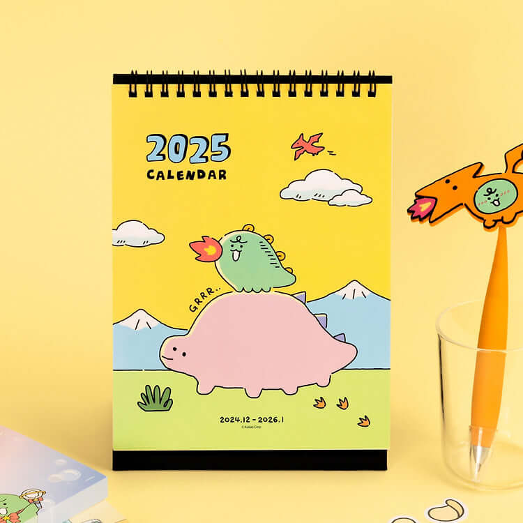 KAKAO FRIENDS Jordi Dino 2025 Calendar with playful dinosaur design on a yellow background.