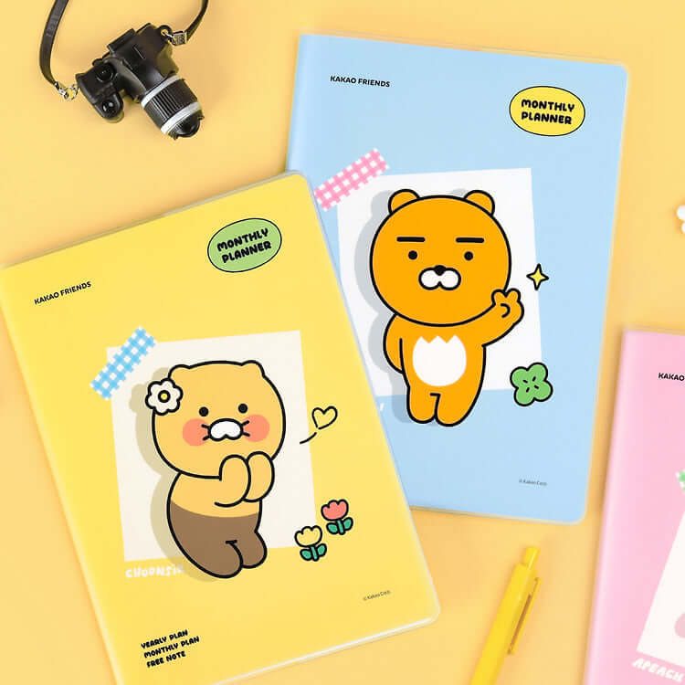 KAKAO FRIENDS Monthly Planner A5 featuring cute characters on yellow and blue covers, ideal for organizing your month efficiently.
