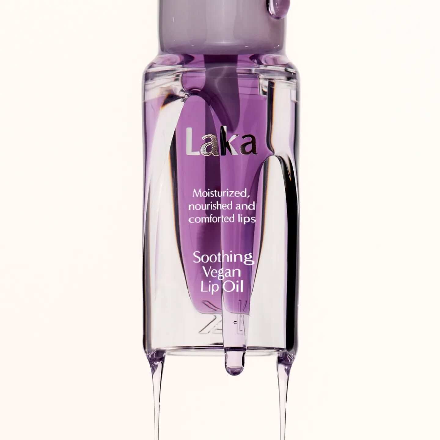 LAKA Soothing Vegan Lip OIl in lavender shade, moisturizing and nourishing lip care product.