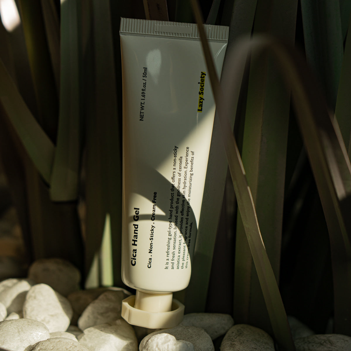 LAZY SOCIETY Cica Hand Gel 50ml tube on stones and plants, Gentleman Korea Korean skincare for men, soothing cica hand gel