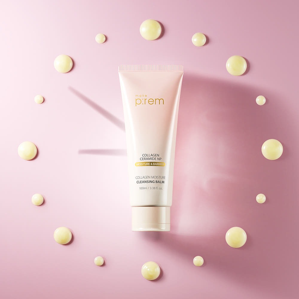 MAKE P:REM Collagen Moisture Cleansing Balm 100ml on pink background with cream drops