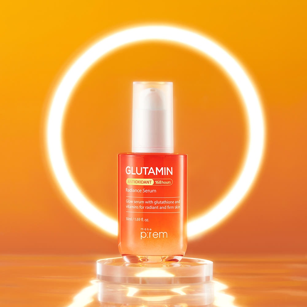 MAKE P:REM Glutamine Antioxidant Radiance Serum 50ml glowing with a bright circular light background.