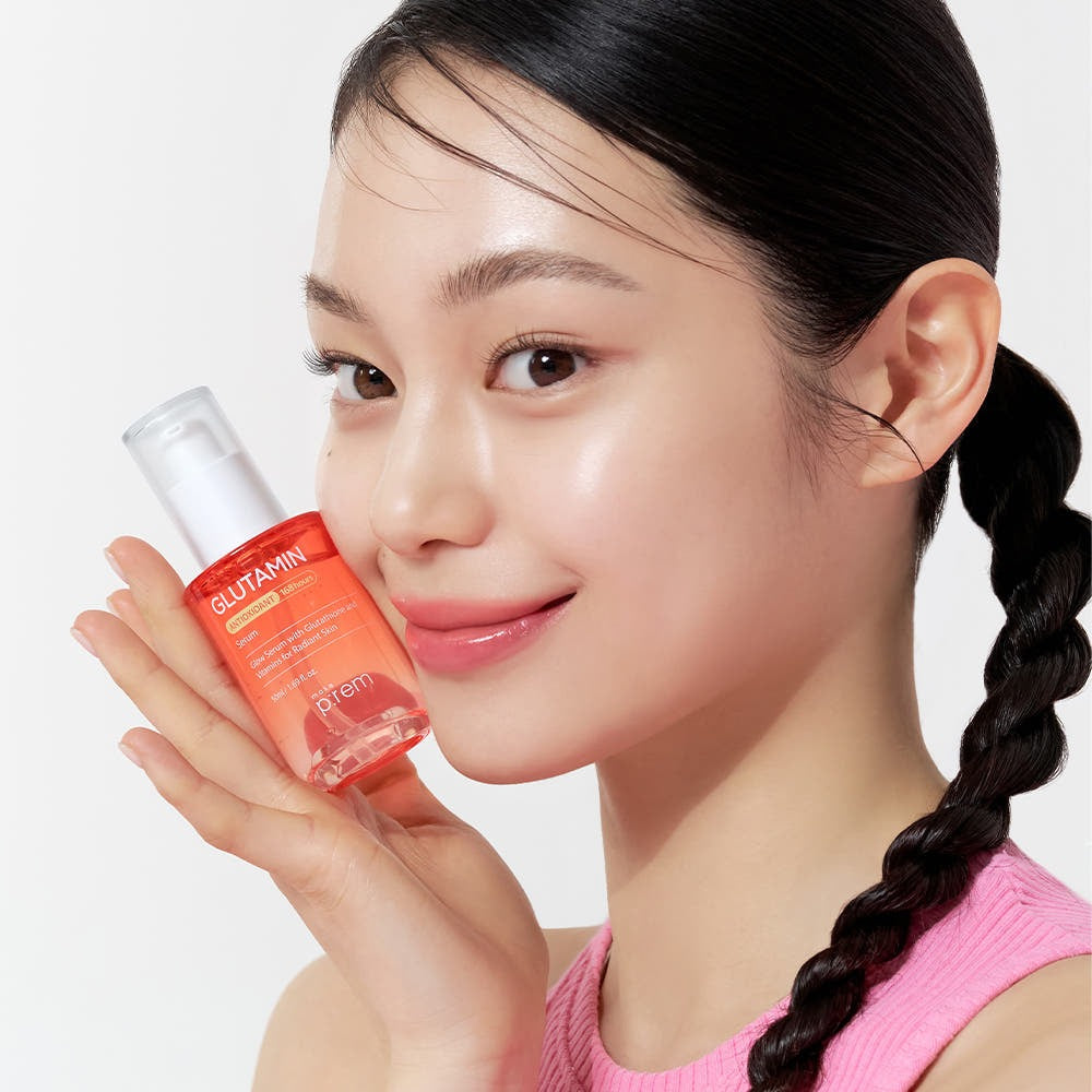 Person holding MAKE P:REM Glutamine Antioxidant Radiance Serum 50ml