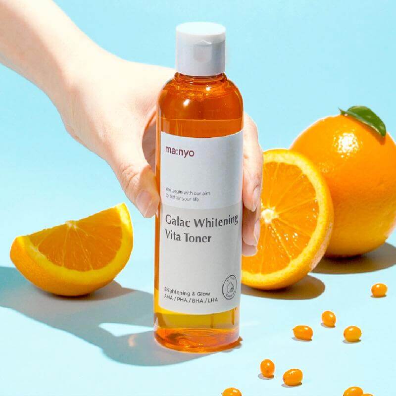 MA:NYO V Galac Whitening Vita Toner 210ml bottle with oranges enhancing brightening and glow benefits.