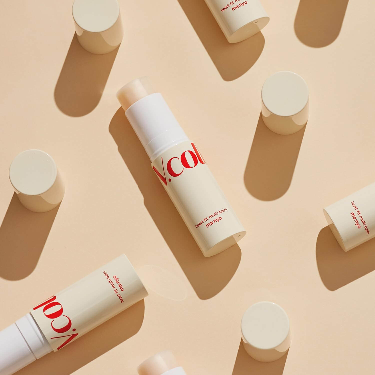 MA:NYO V Collagen Heart Fit Multi Balm 10g displayed on a beige background
